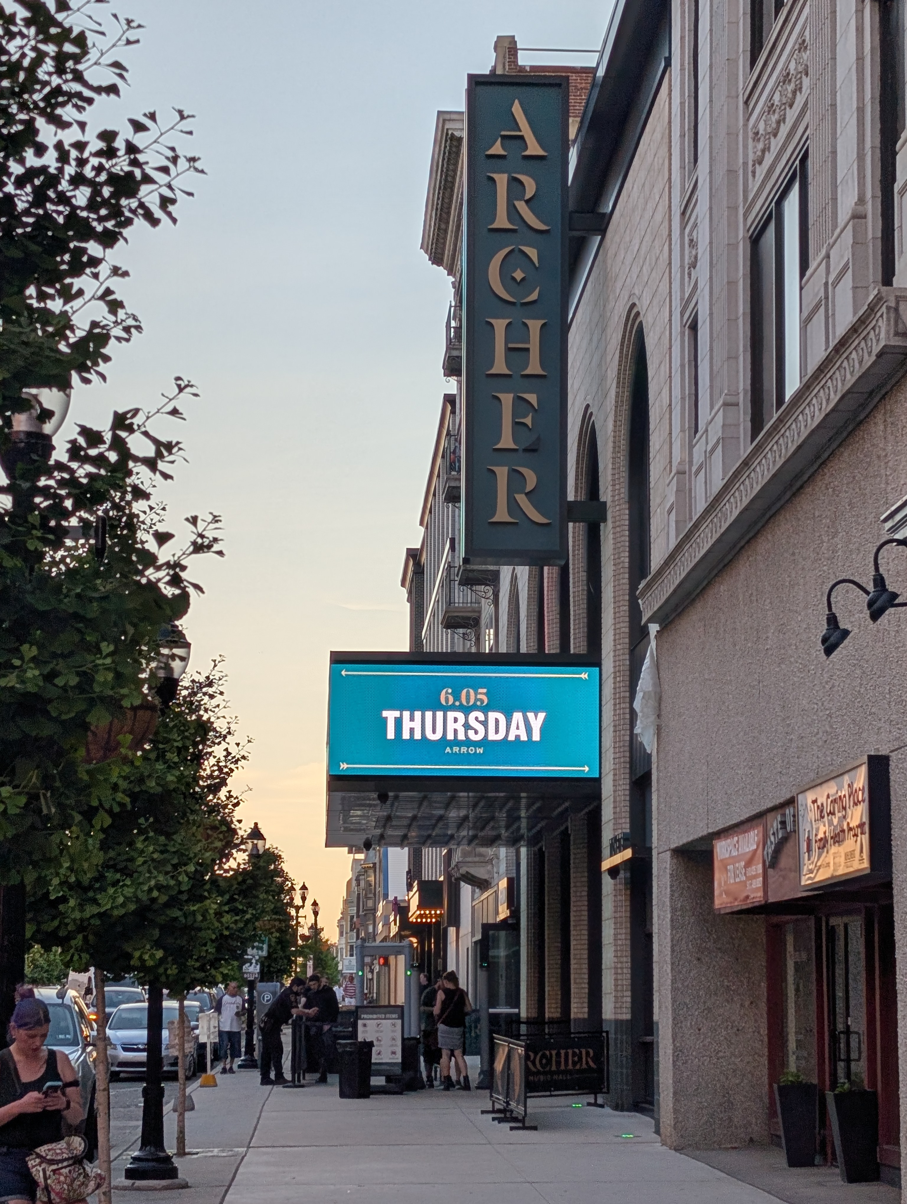 Exterior of a concert venue with the sign reading 'Thursday'.