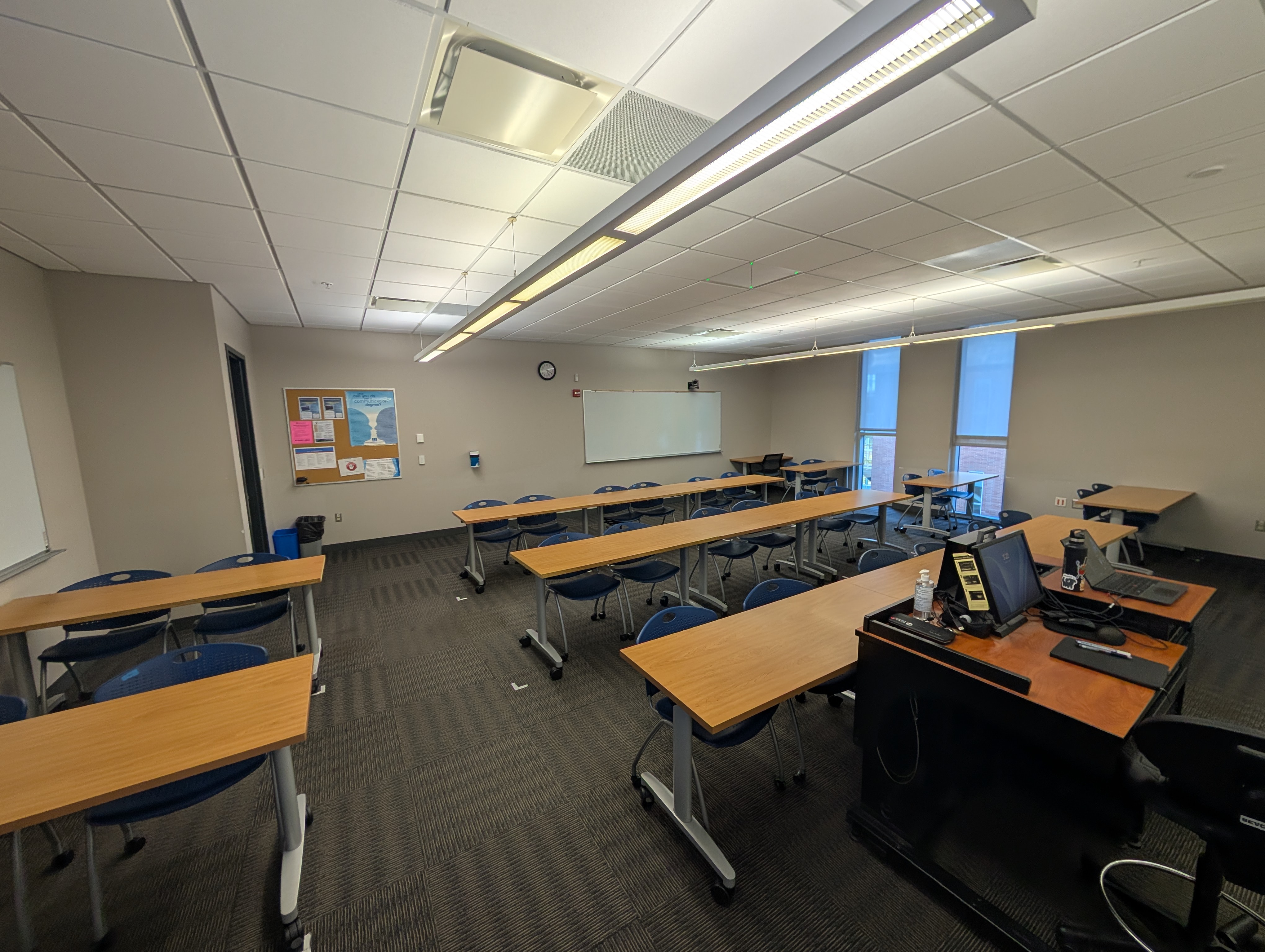 An empty classroom from the front point-of-view.
