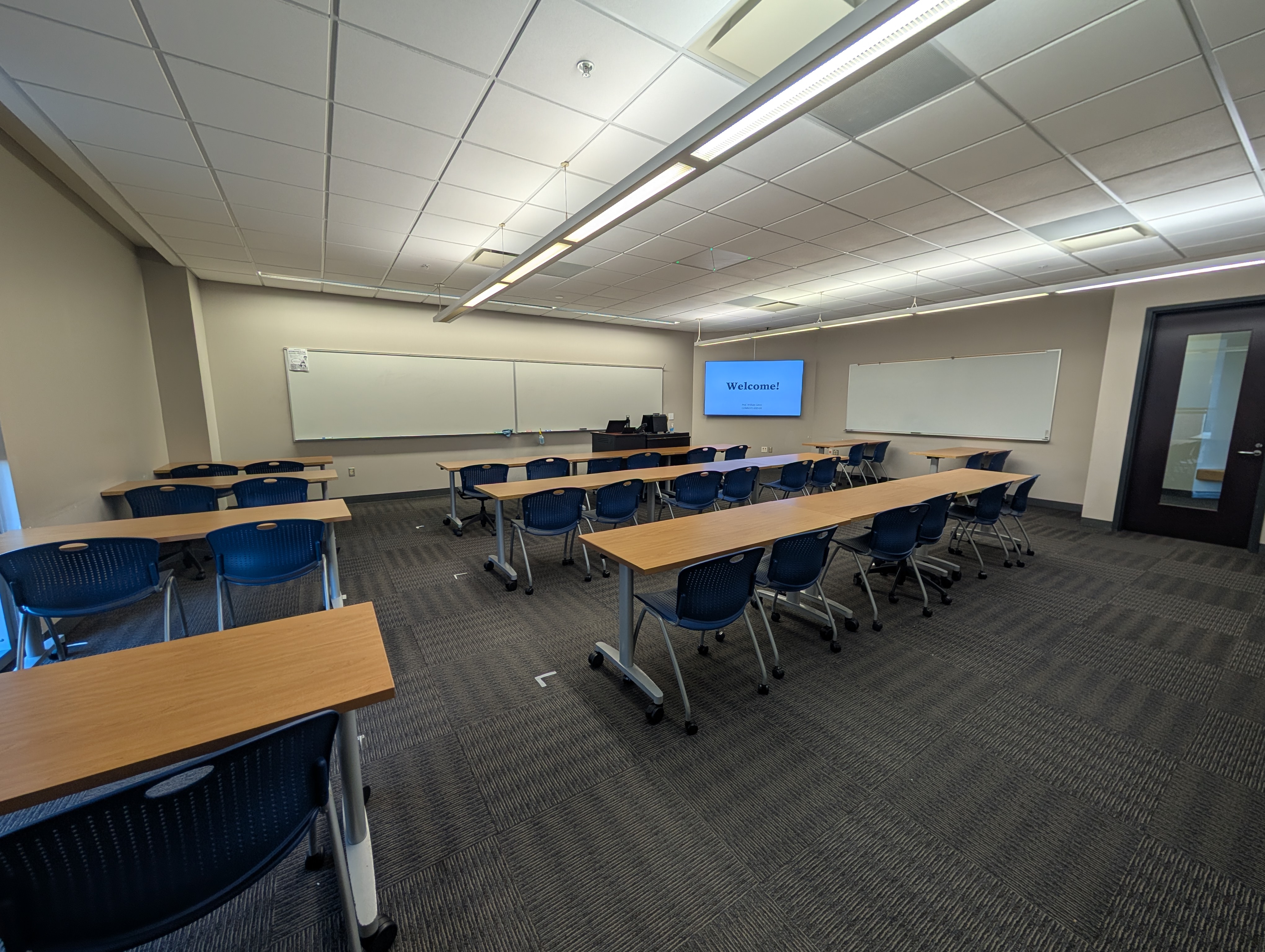 An empty classroom from the back point-of-view.