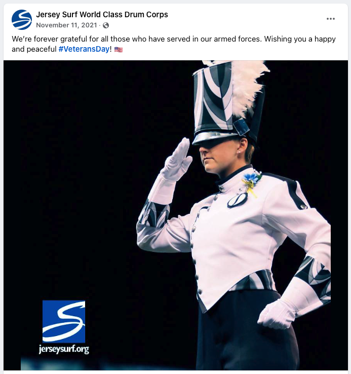 A screenshot of a social media post featuring a drum major
