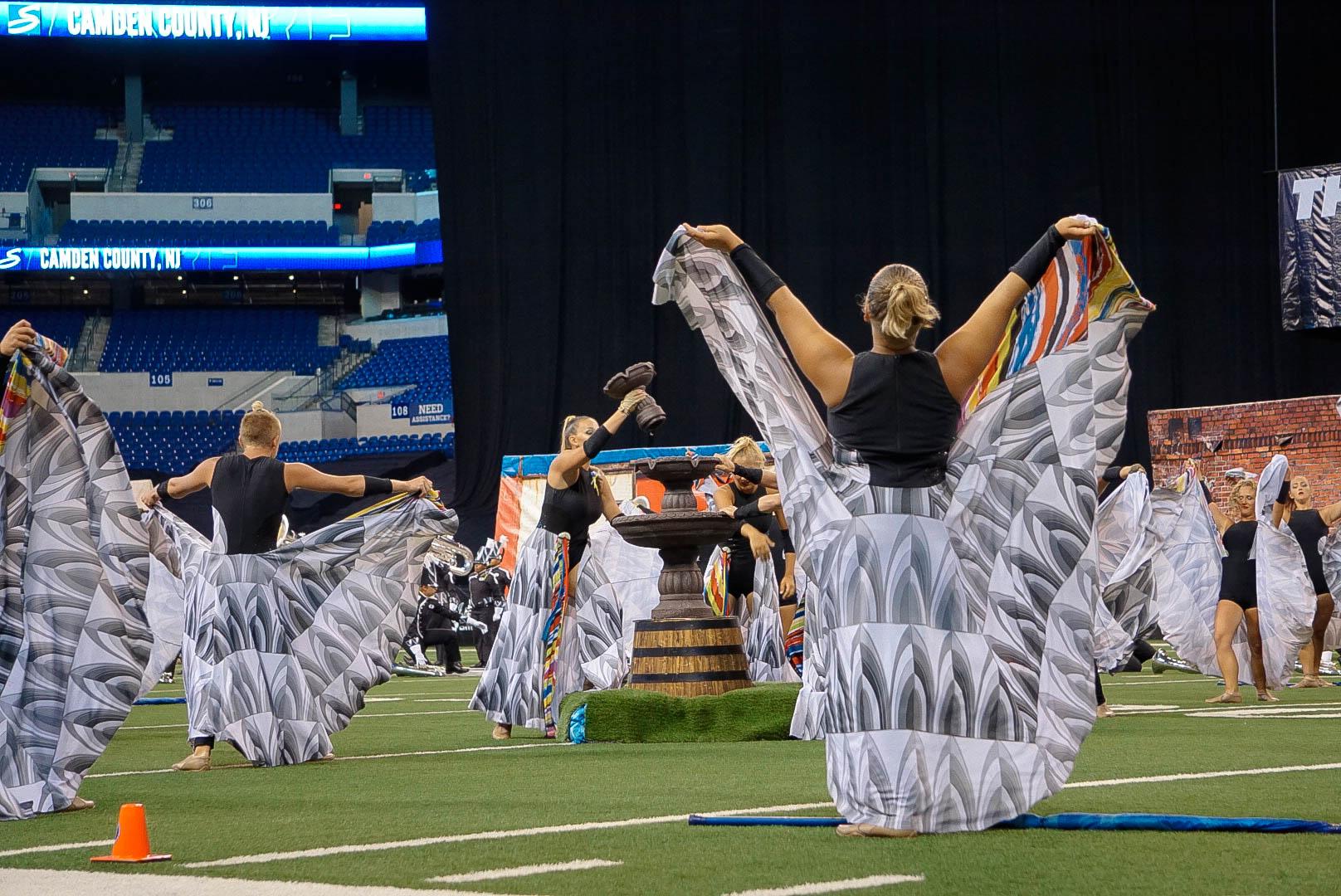 Drum corps color guard members during a show