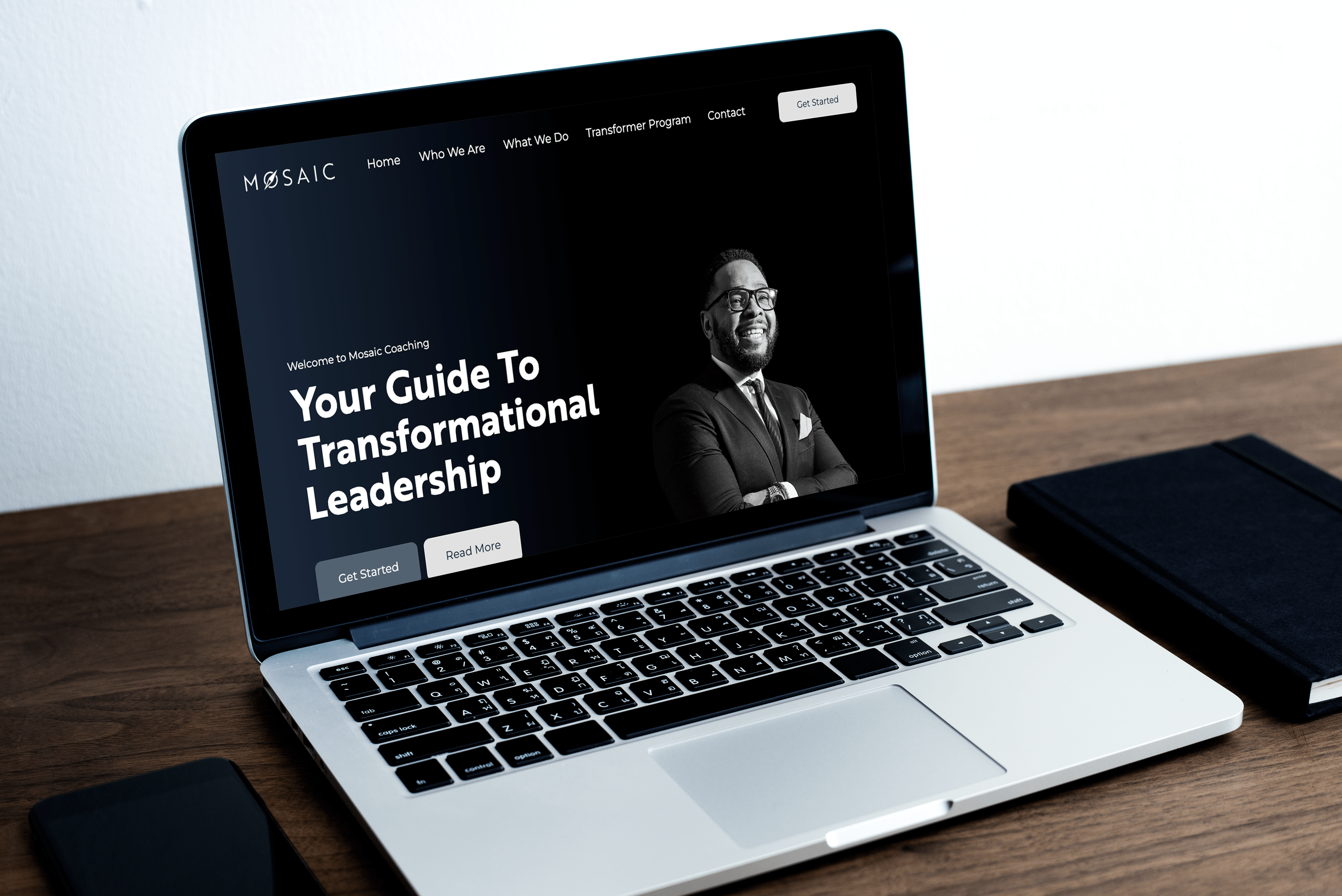 The Mosaic Coaching logo branded on a website.